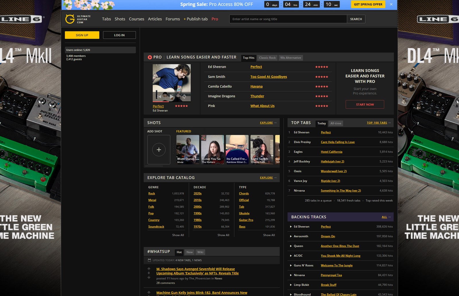 Ultimate Guitar’s 2022 homepage: a dark, crowded layout with a sale banner, large side ads, a users-online box, and dense lists of top tabs, Shots, and backing tracks